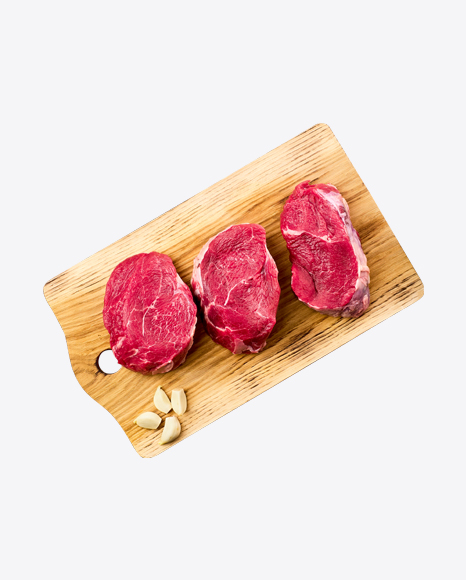Raw Steaks w/ Garlic Cloves on Wooden Board PNG
