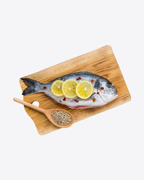 Dorado w/ Spices, Lemon Slices & Spoon on Wooden Board PNG