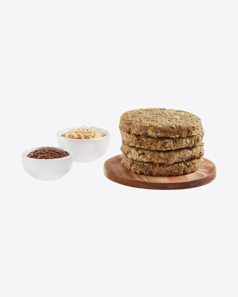 Stack of Vegan Patties on Wooden Board w/ Sesame Seeds