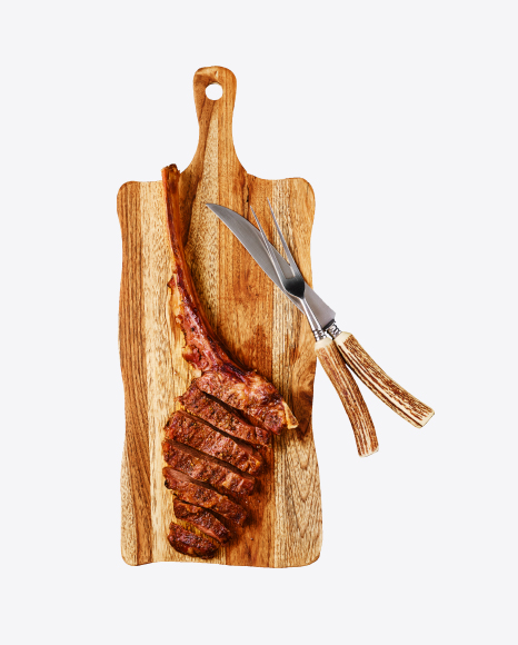 Tomahawk Steak on Wooden Board w/ Cutlery