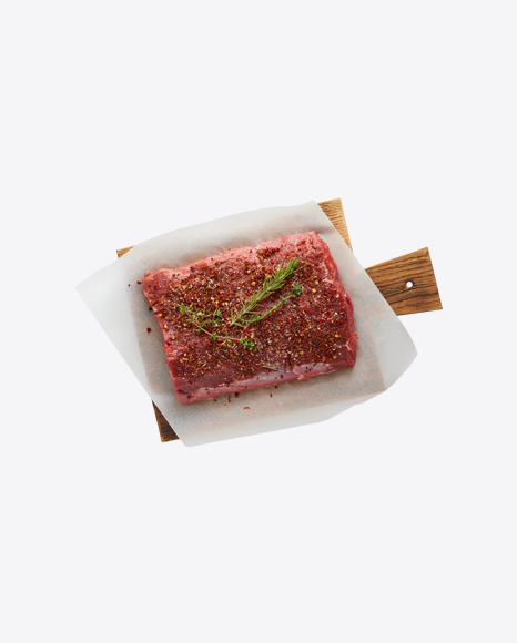 Raw Beef Piece w/ Slices on Wooden Board
