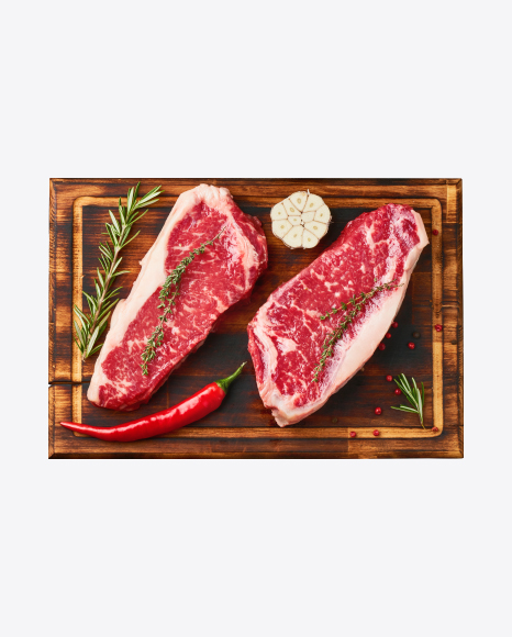 Raw Meat Pieces on Wooden Board