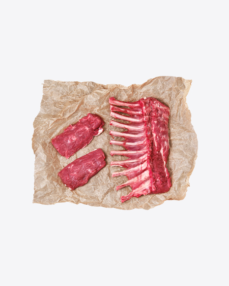 Raw Rack of Lamb & Steaks in Wrapping Paper