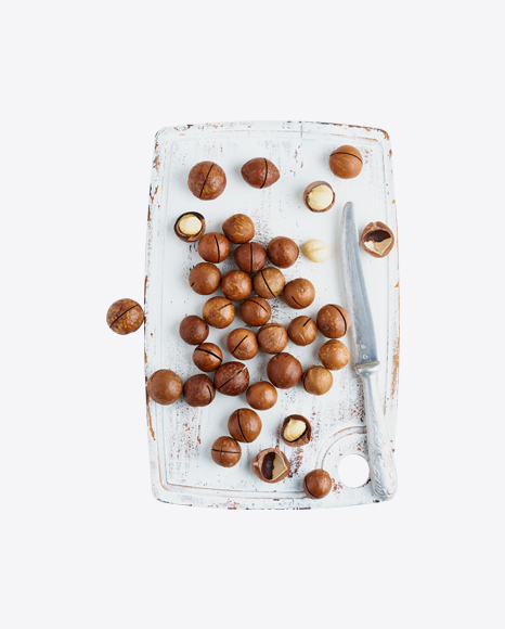 Macadamia Nuts on Wooden Board w/ Knife PNG