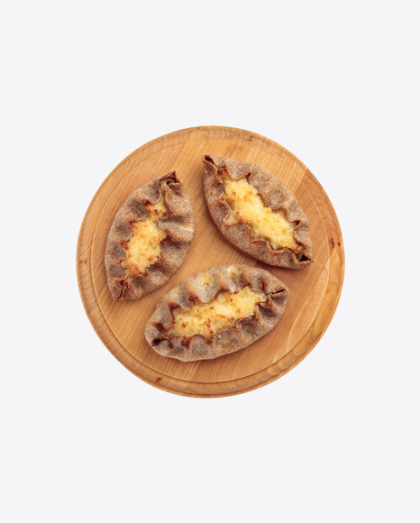 Potato Kalitka Pies on Wooden Board PNG