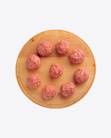 Raw Meat Balls on Wooden Board
