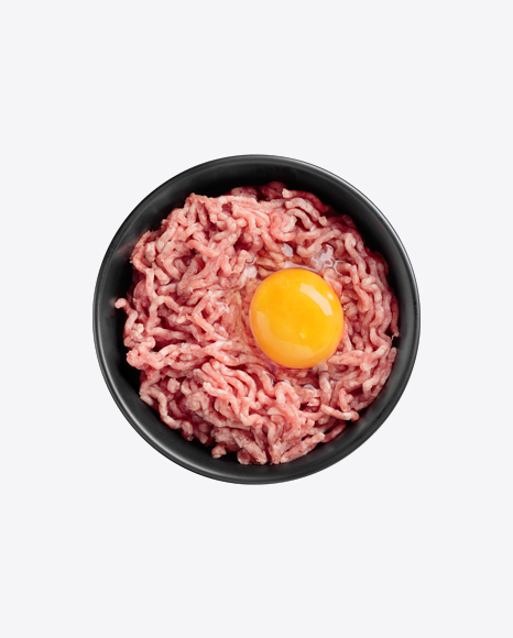 Ground Meat w/ Raw Egg in Black Ceramic Bowl