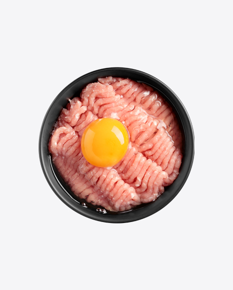 Ground Meat w/ Raw Egg in Black Ceramic Bowl