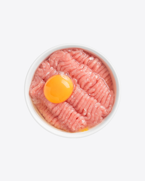 Ground Meat w/ Raw Egg in White Ceramic Bowl